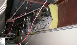 Fiberglass batt insulation falling out of place
